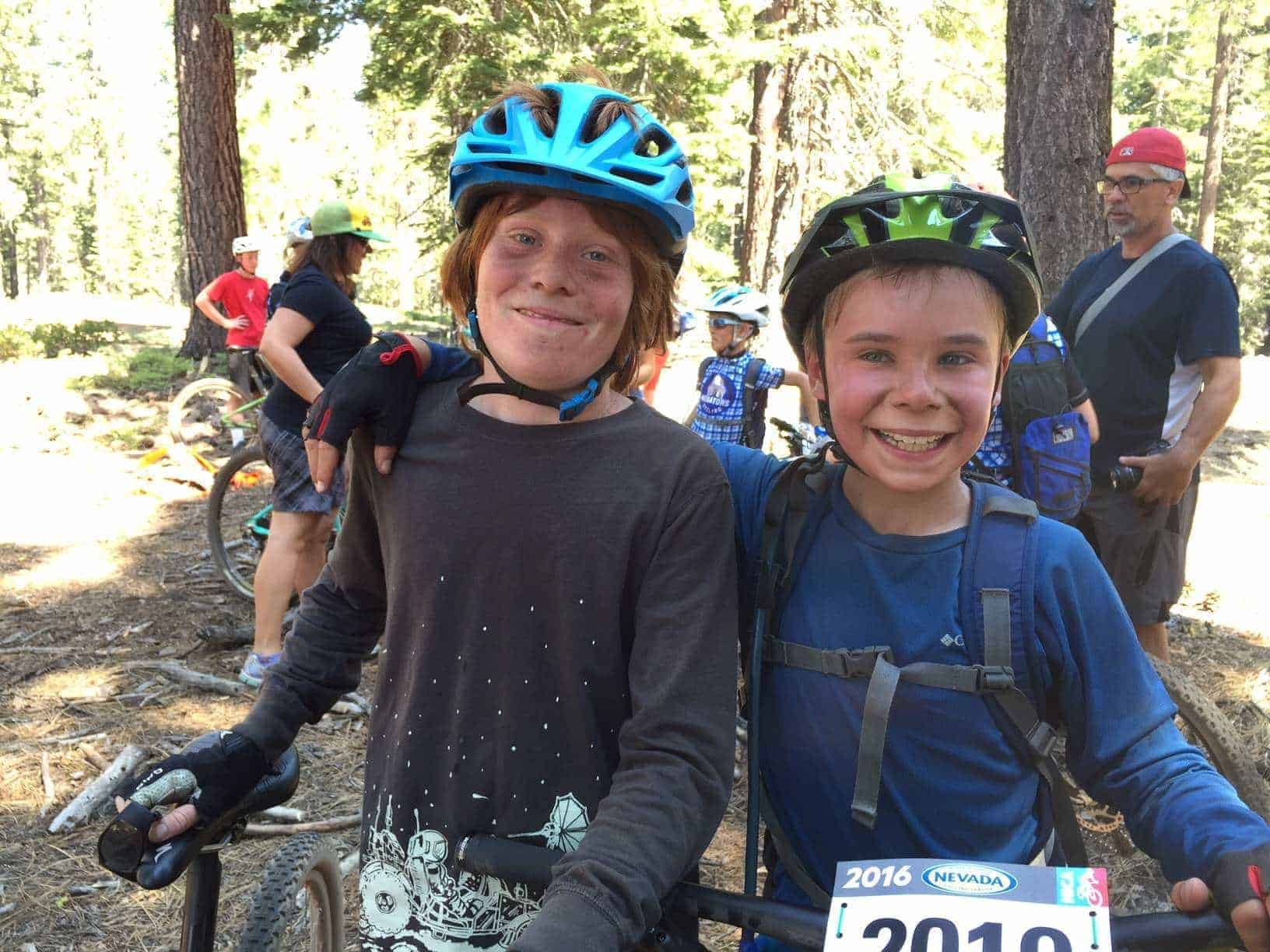 students on bikes smiling