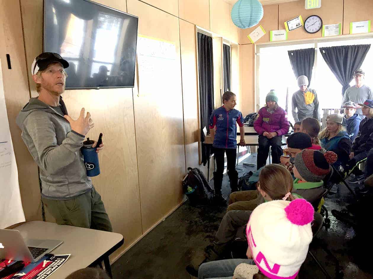 teacher giving a lecture to students