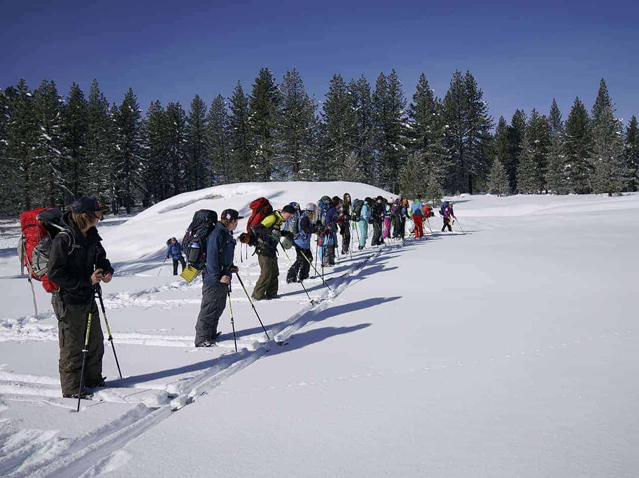 students lined up for a ski practice race