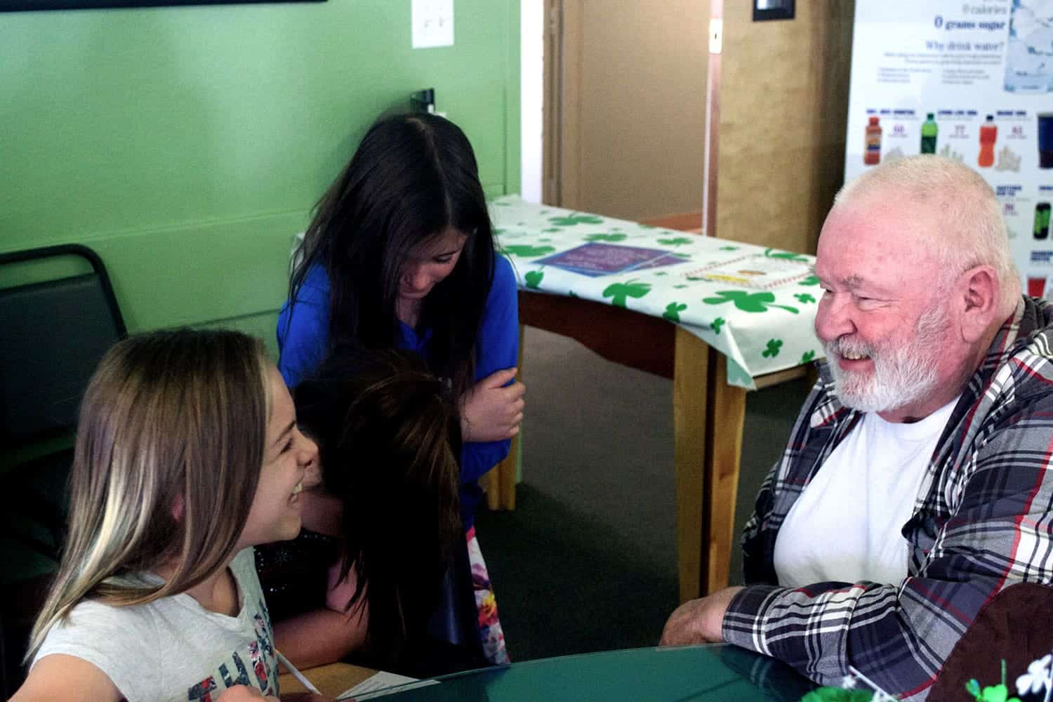 TEA students talking to a senior