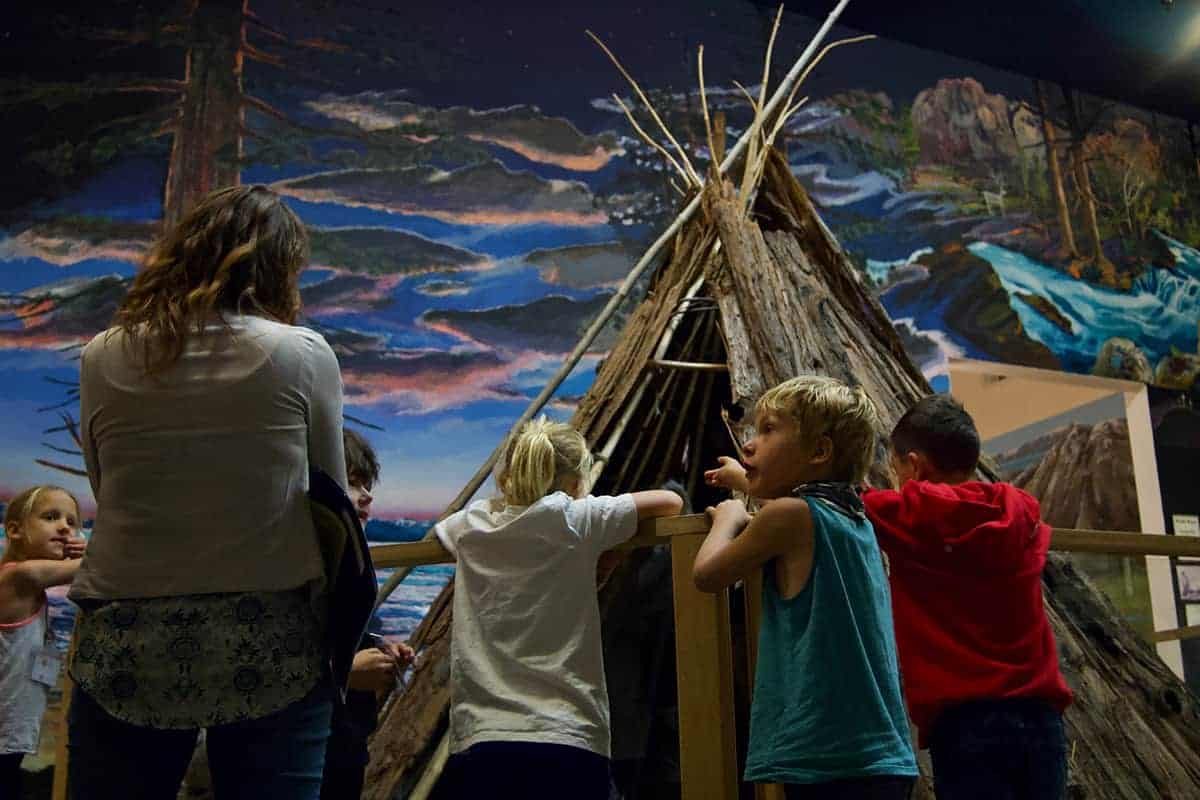 students looking at an installation at the Cultural museum