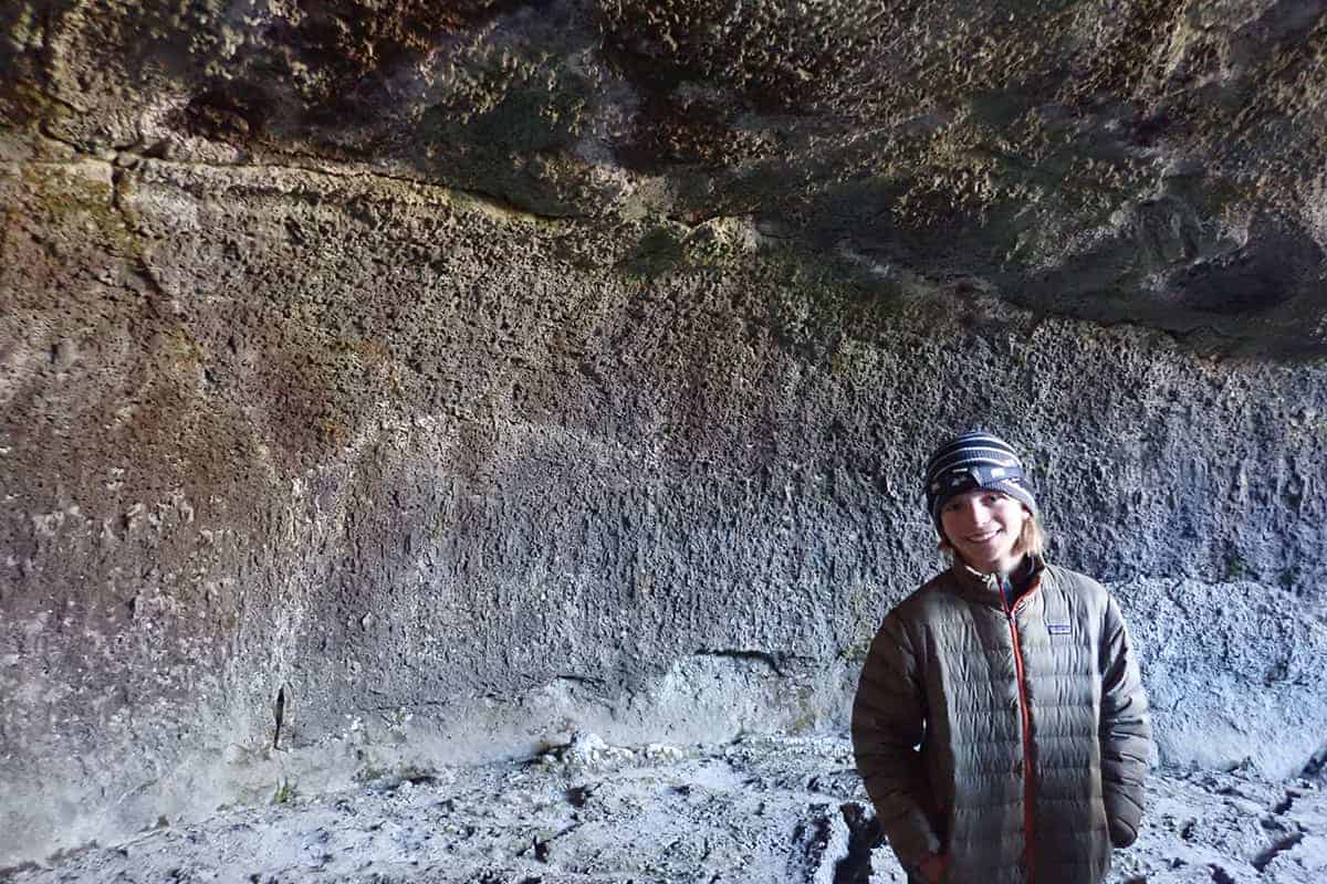 student inside a cave