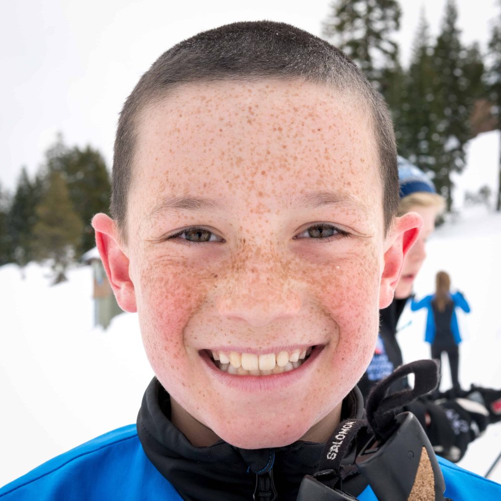 student smiles for the camera