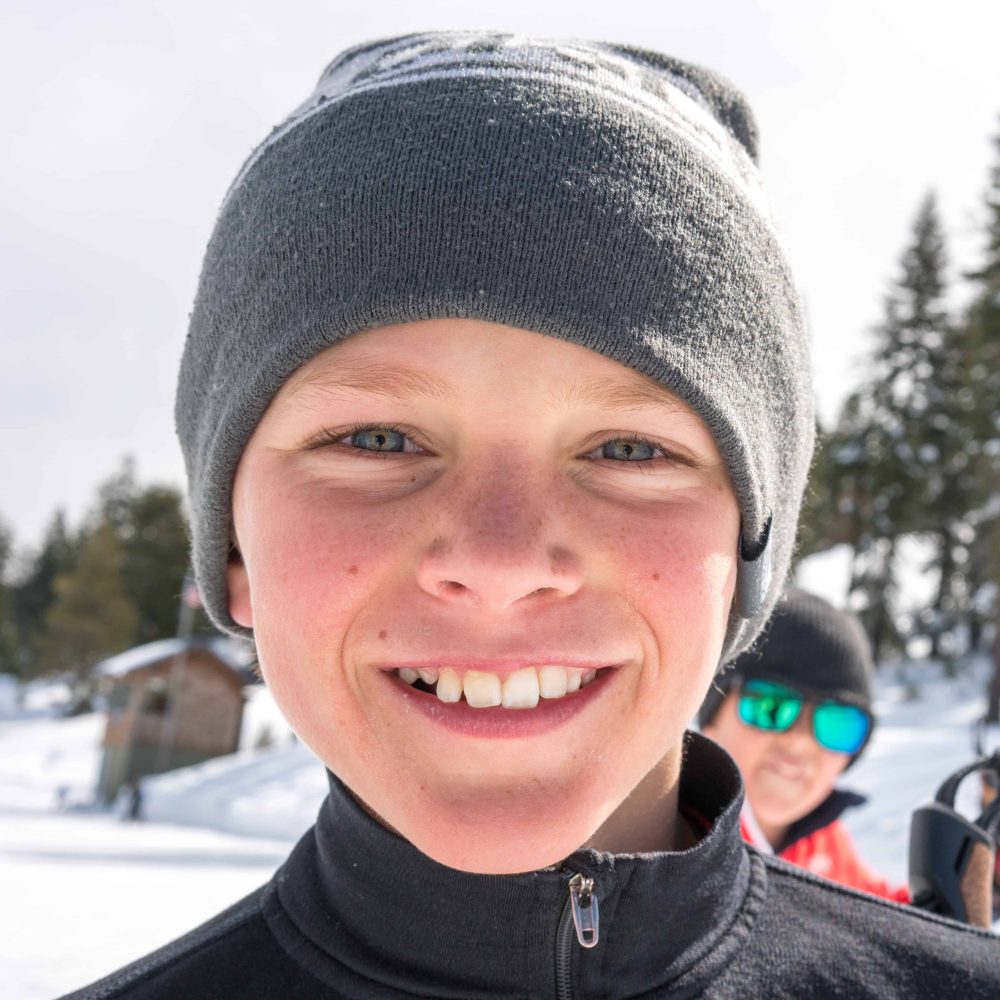 student smiles for the camera