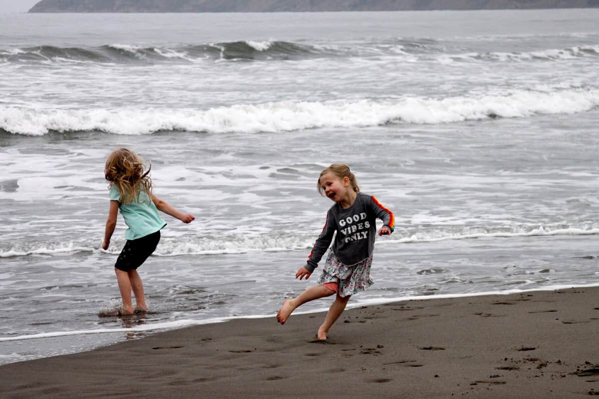 kindergarteners playing at the beach