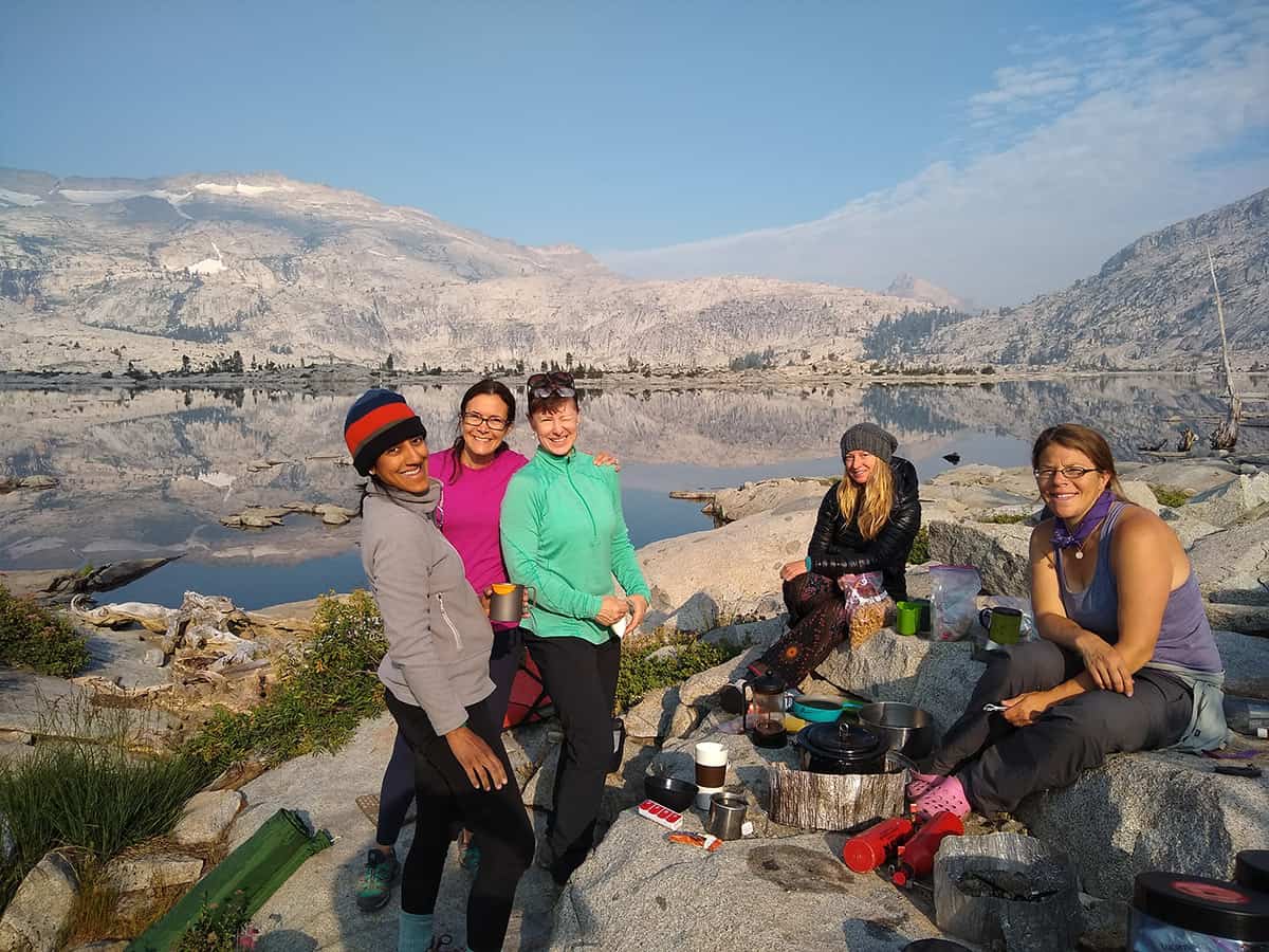 womens backpackingcrew in front of aloha lake