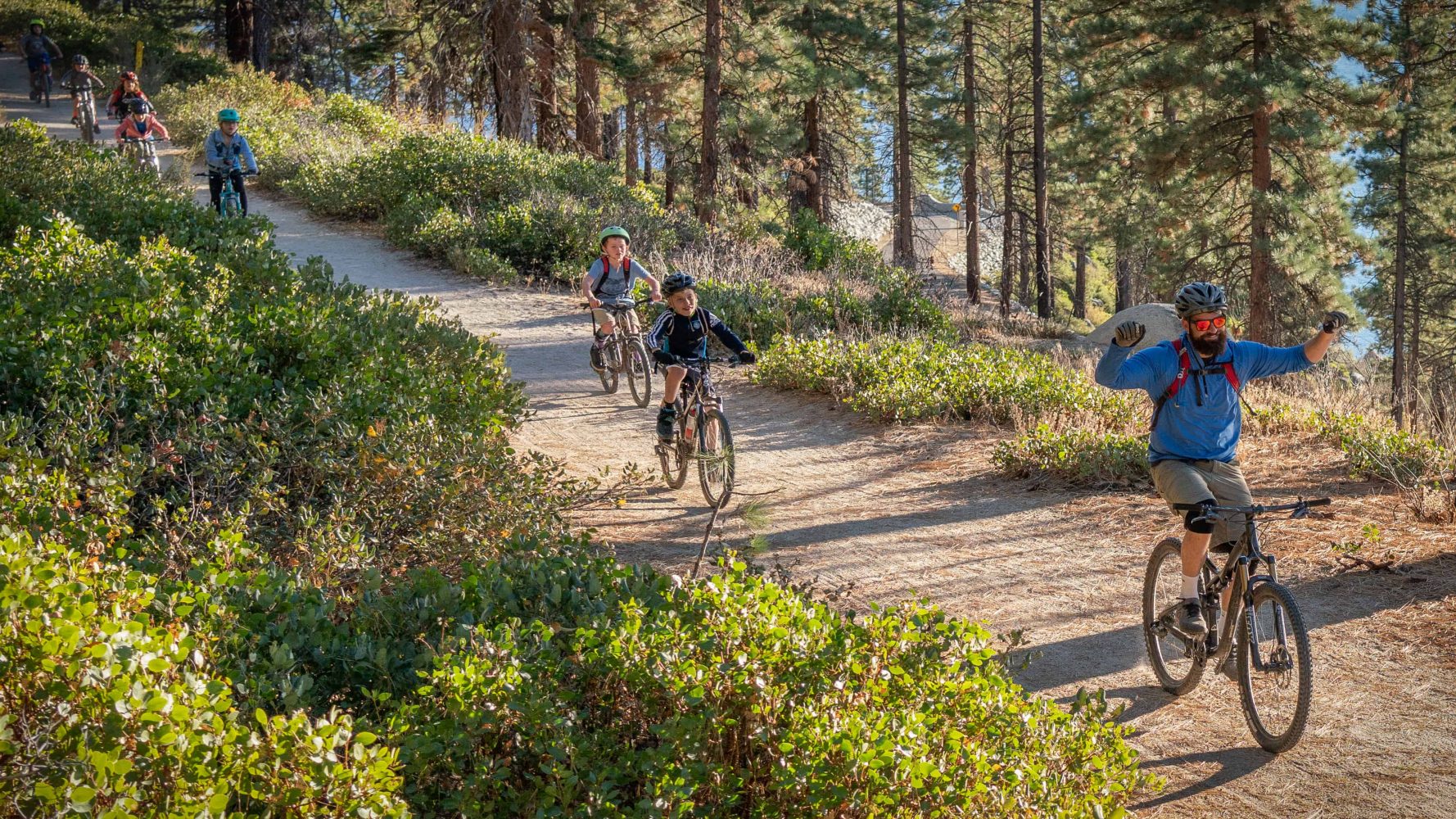 teacher cheering after finishing a trail