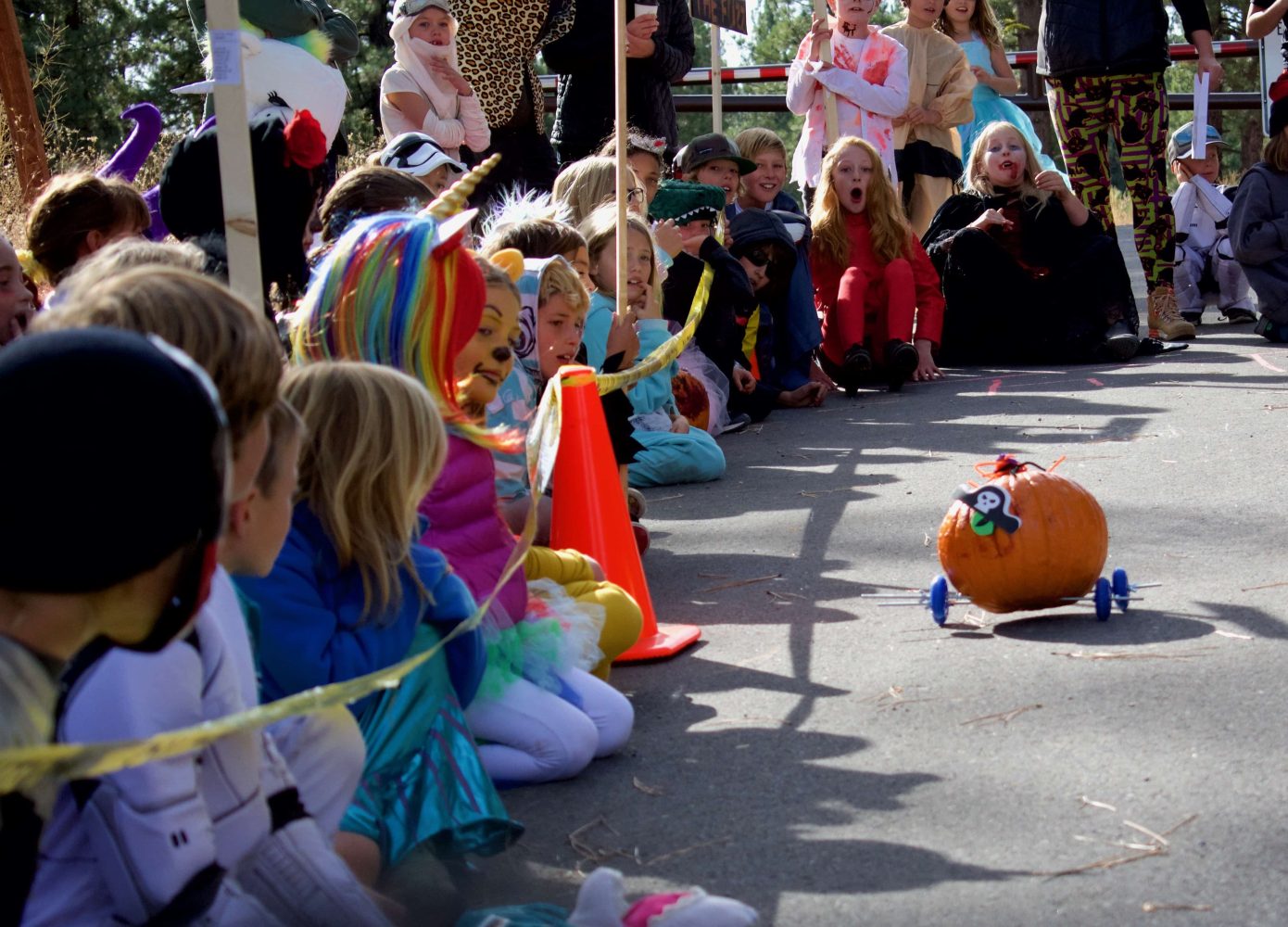 pumpkin racer rolling down the track