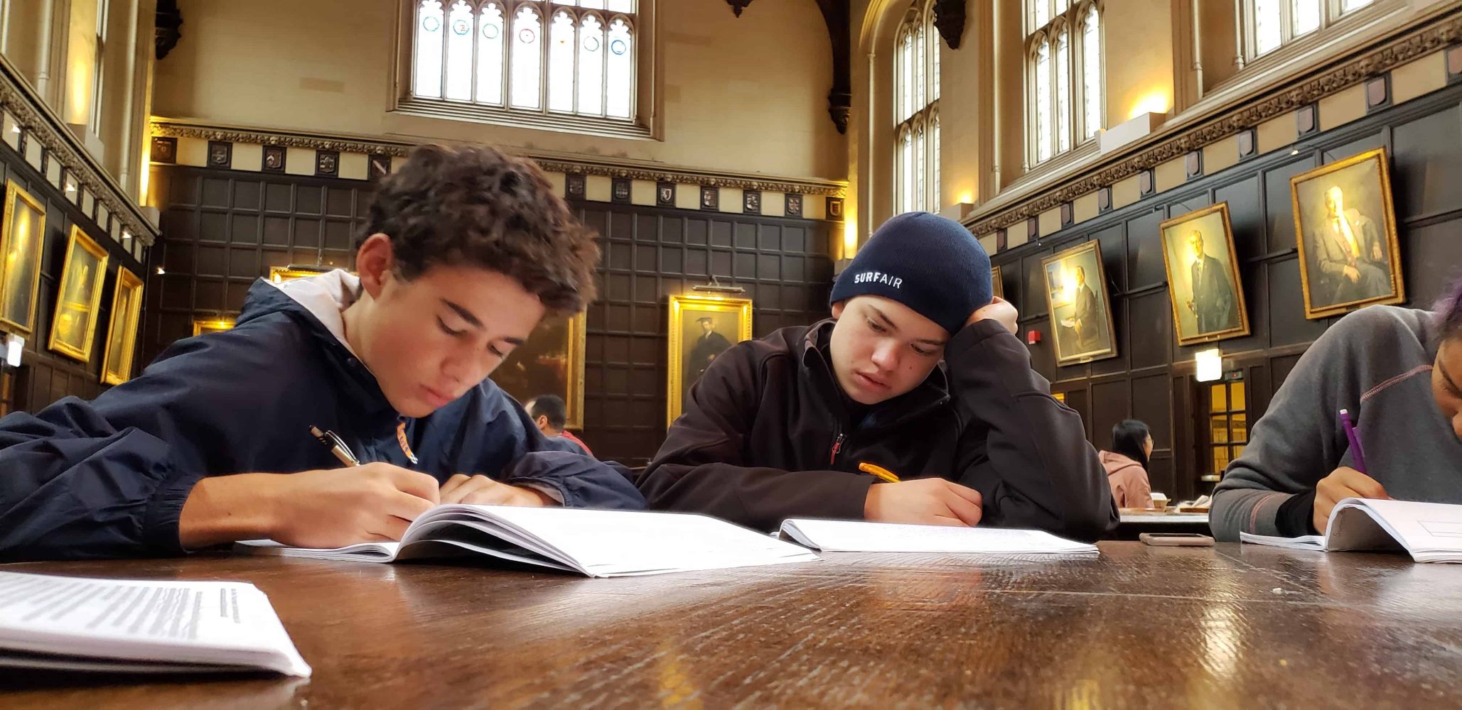 students studying at a desk