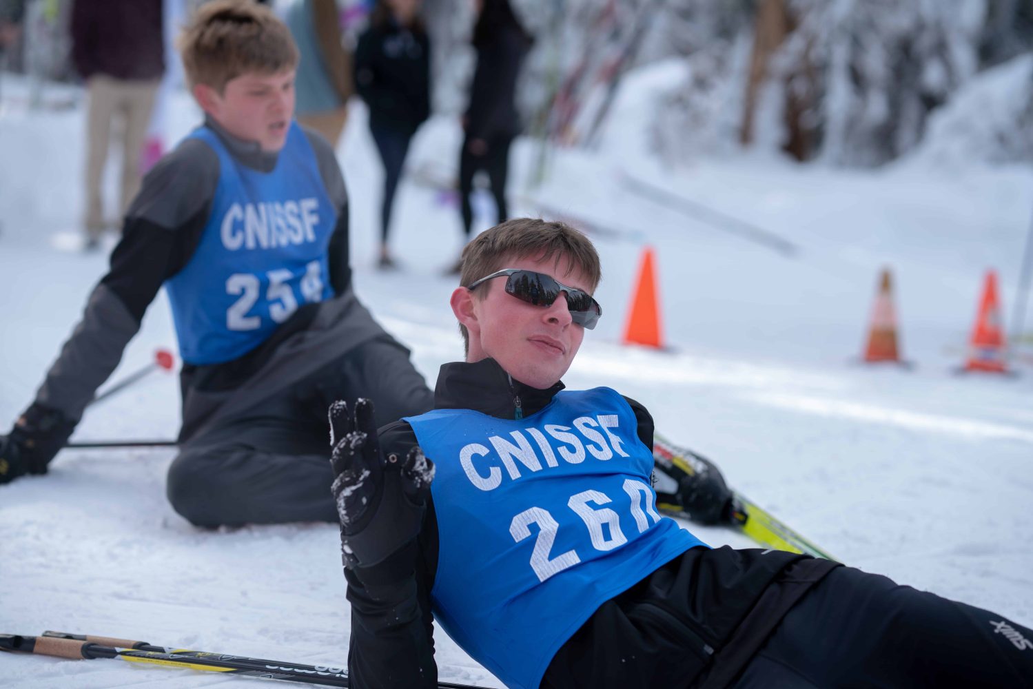 race participants taking a break in the snow