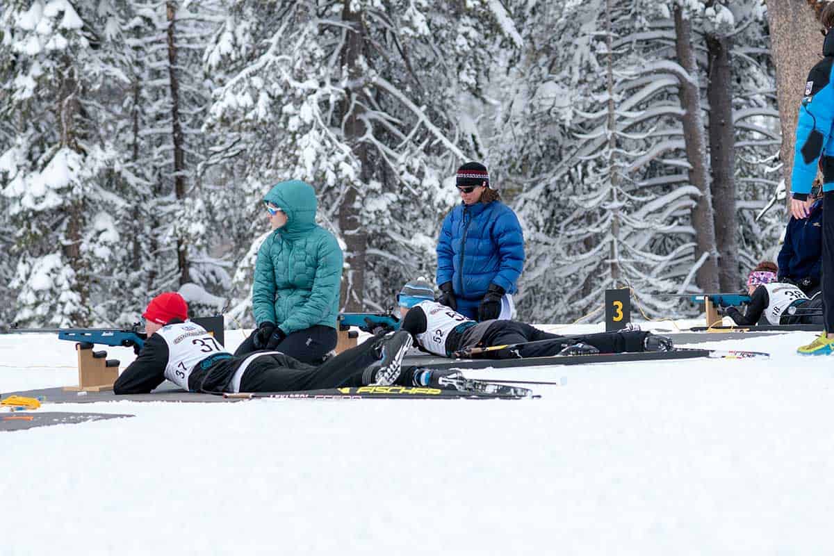 biathlete students at the shooting range