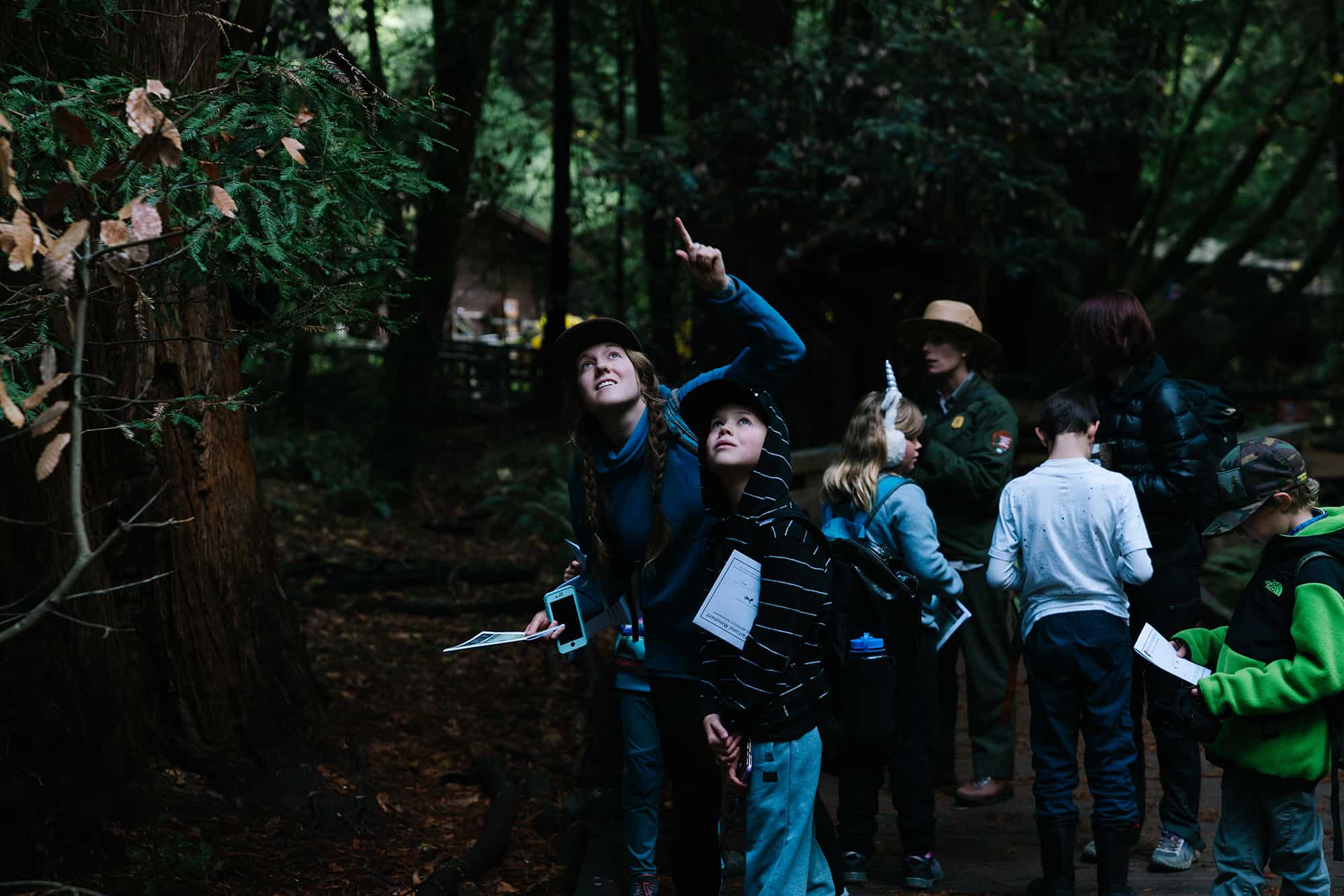 4th graders walkinjg through the woods