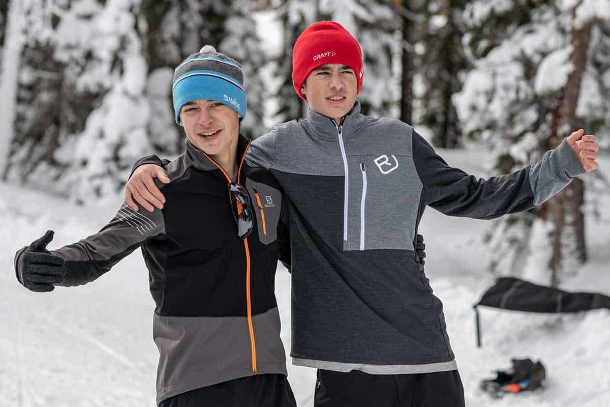 two biathletes posing for a picture
