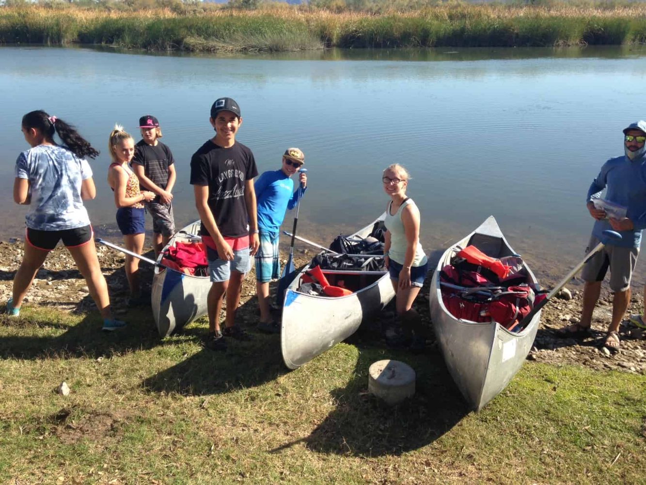 students preparing their boats