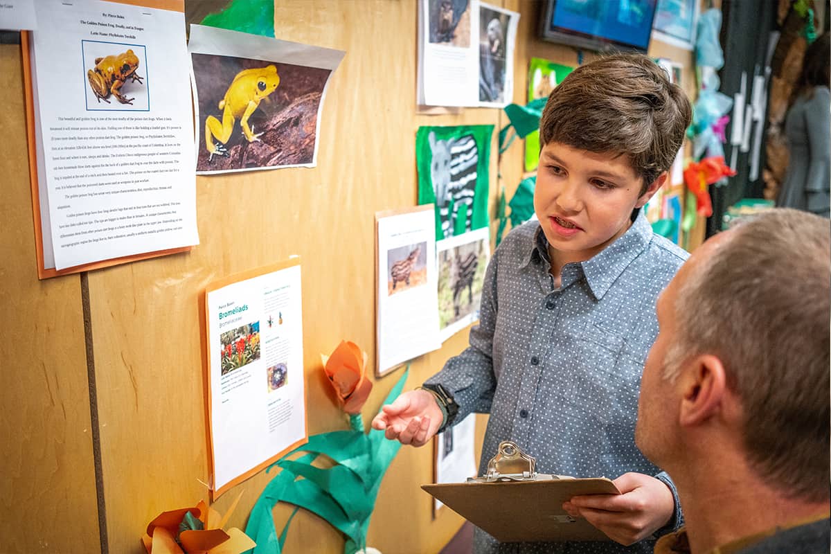 students and guests inside the celebration of learning event