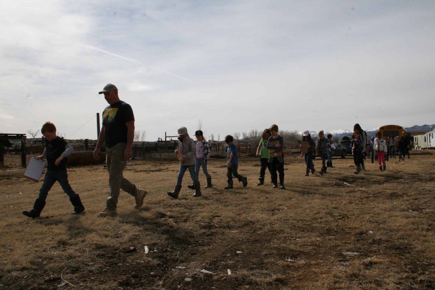 students walking through a field