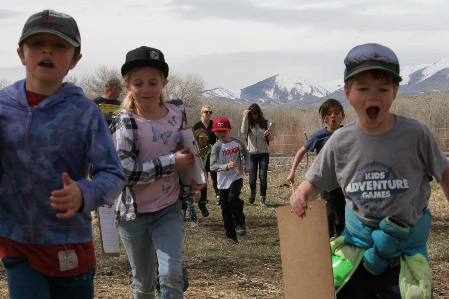 kids excitedly running to see the beehive