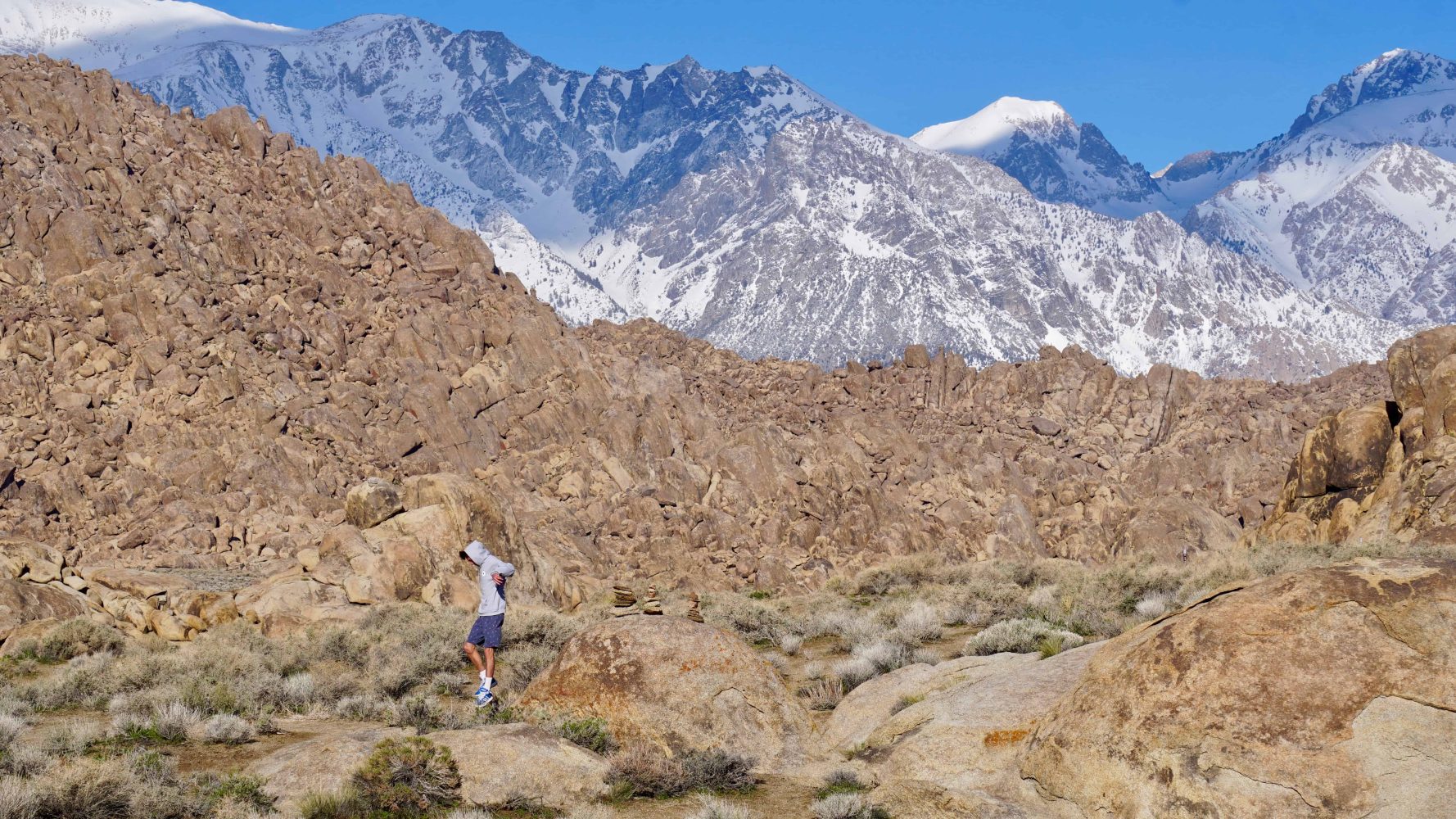 students trekking through the alabama hills