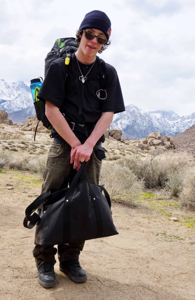 a student with their backpack