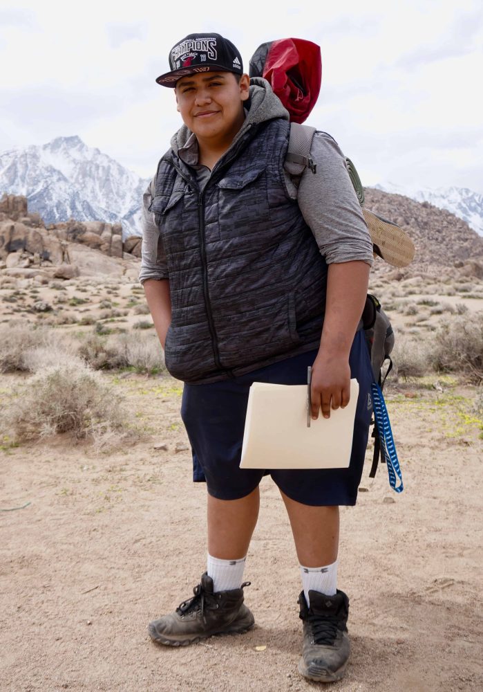 a student with their backpack