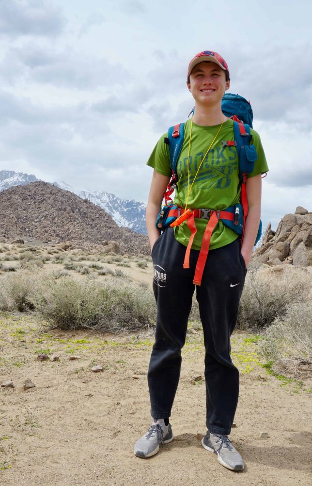 a student with their backpack