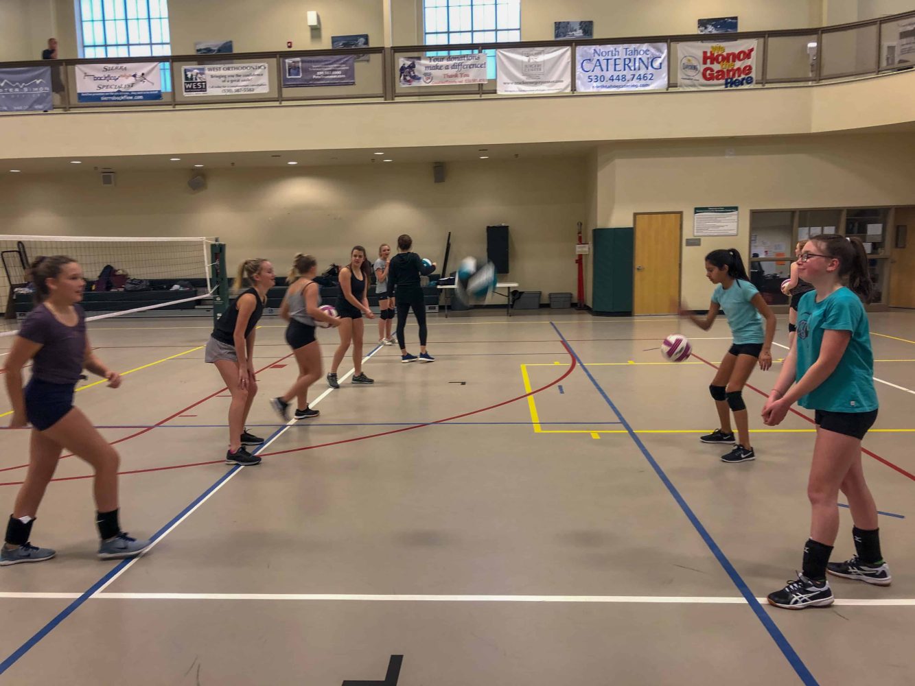 TEA volleyball team practicing on the court