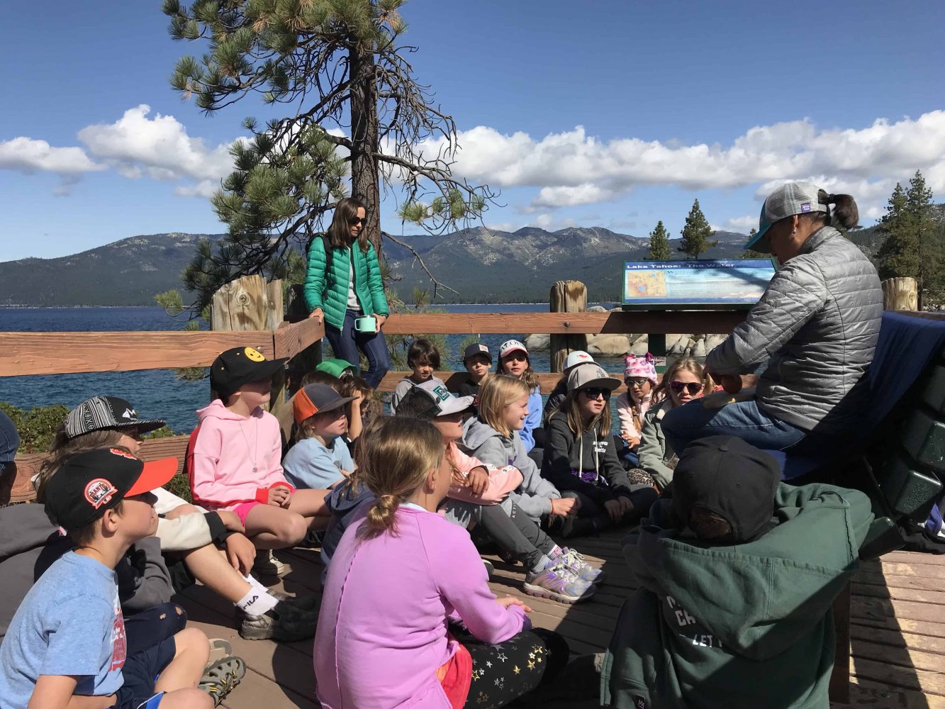 students gathered around a teacher