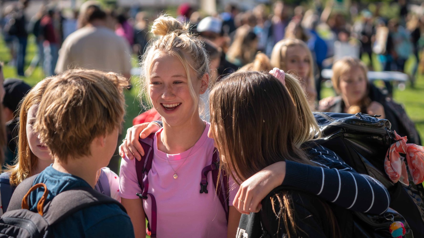 girl talks with her friends at the protest