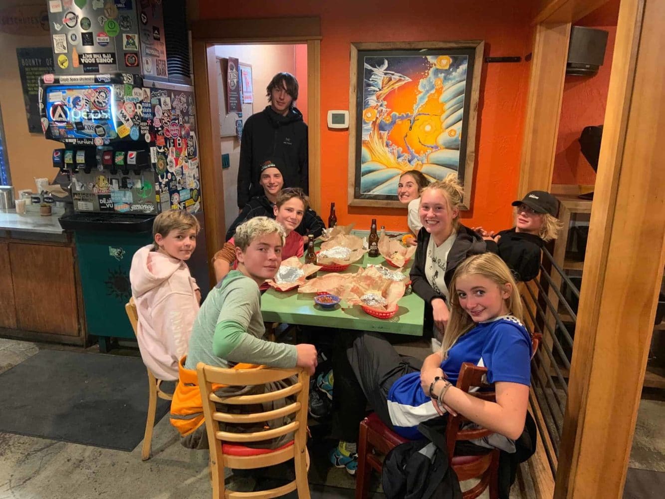 students eating lunch at a table