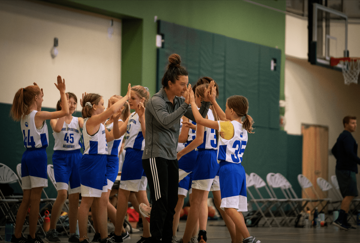 the team giving each other high fives