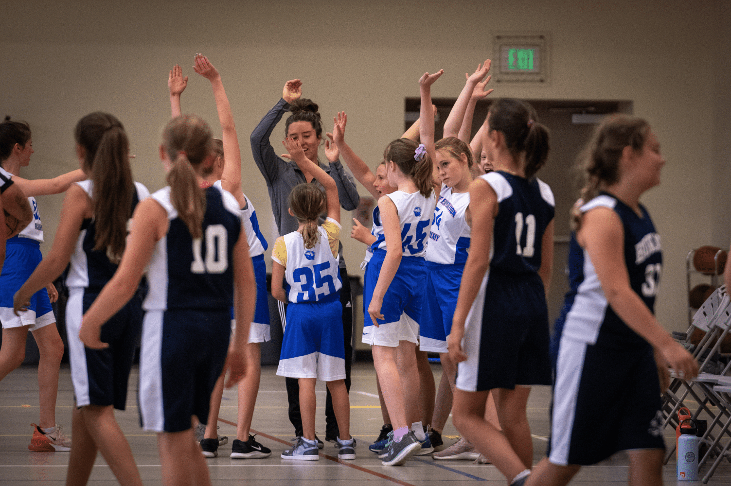 the team giving each other high fives