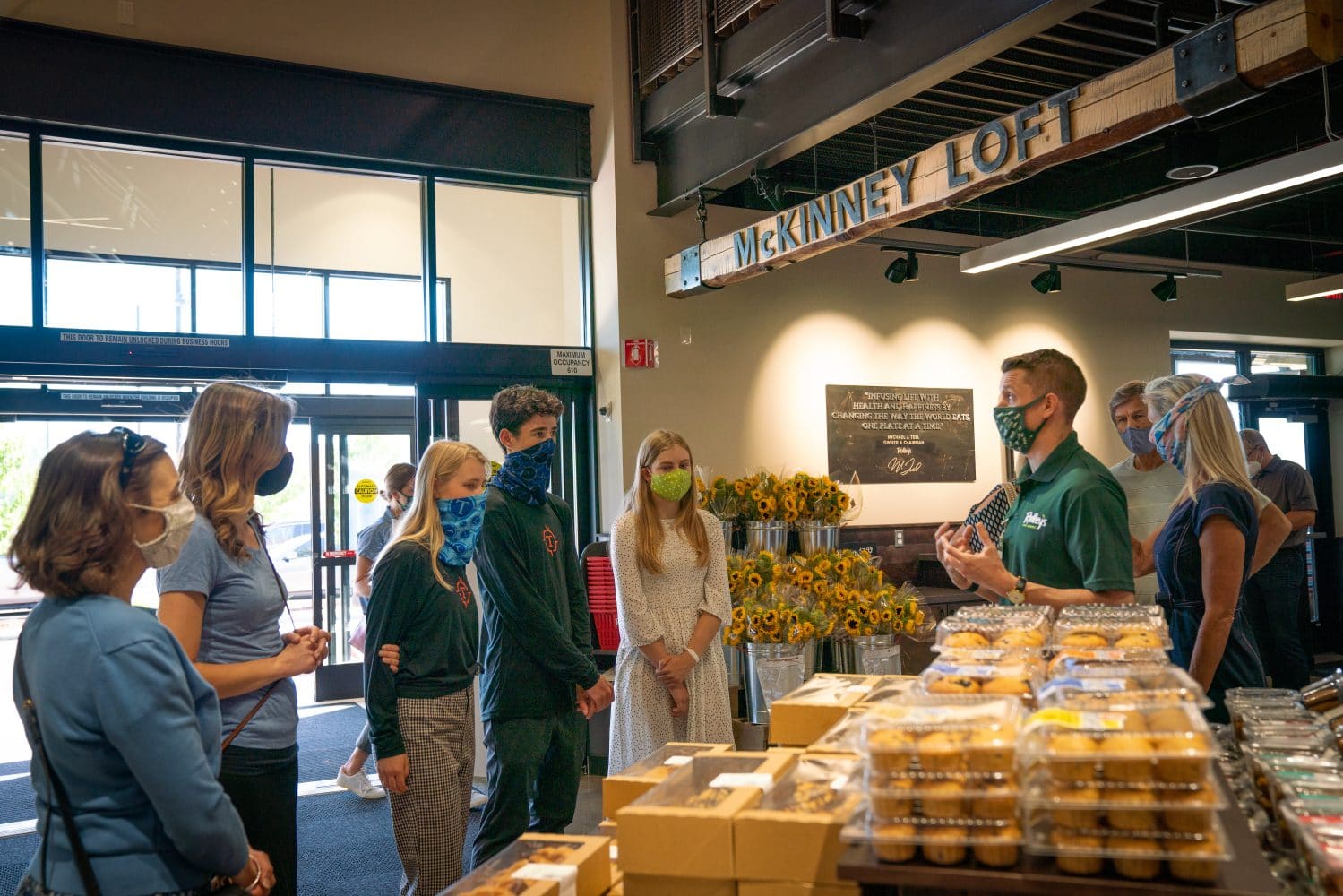 The Eco Club talking with Raley's staff